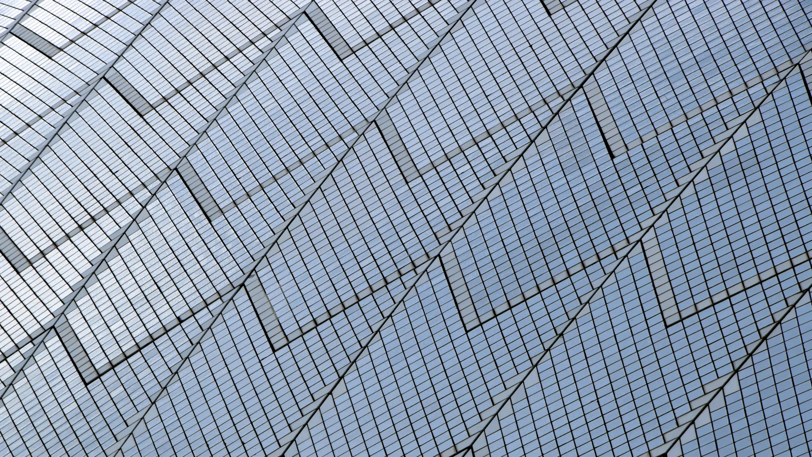 Close view of the tiled concrete shell geometry on the Sydney Opera House roof
