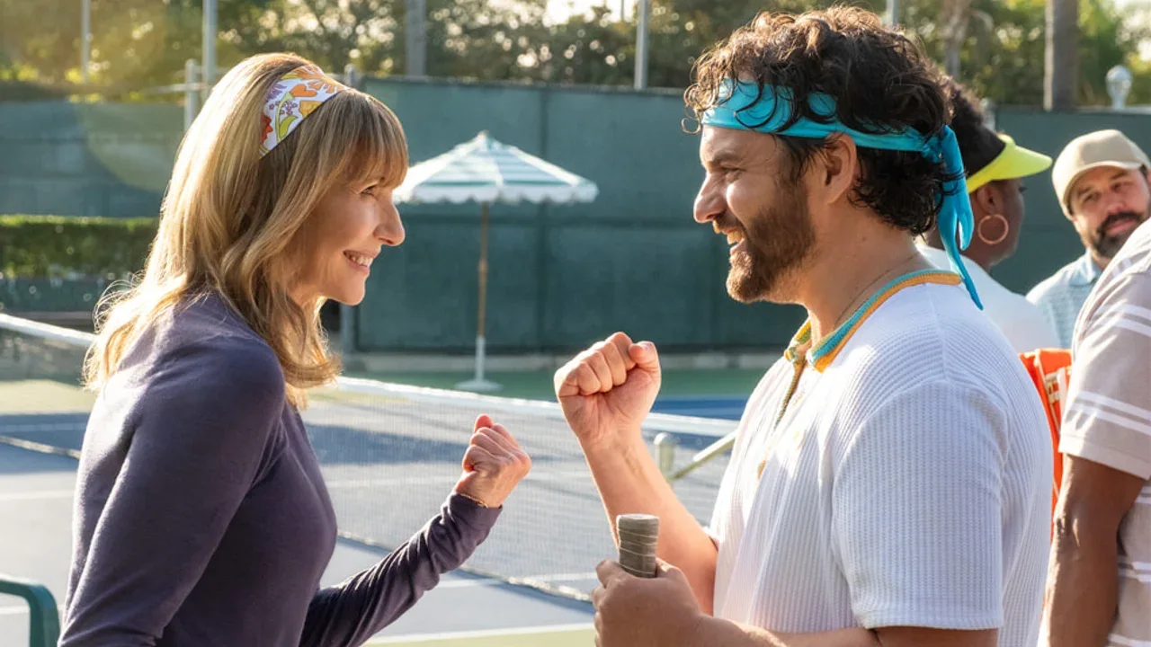 Mary Steenburgen and Jake Johnson standing on a pickleball court in Apple TV's official trailer image for The Dink