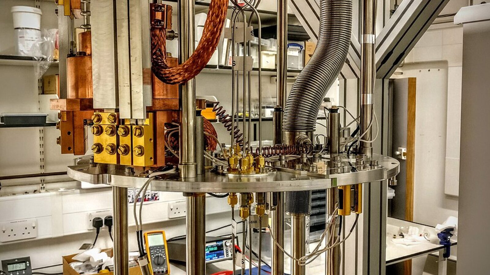 The copper, gold and steel interior of a dilution refrigerator used for quantum-computing experiments at University College London