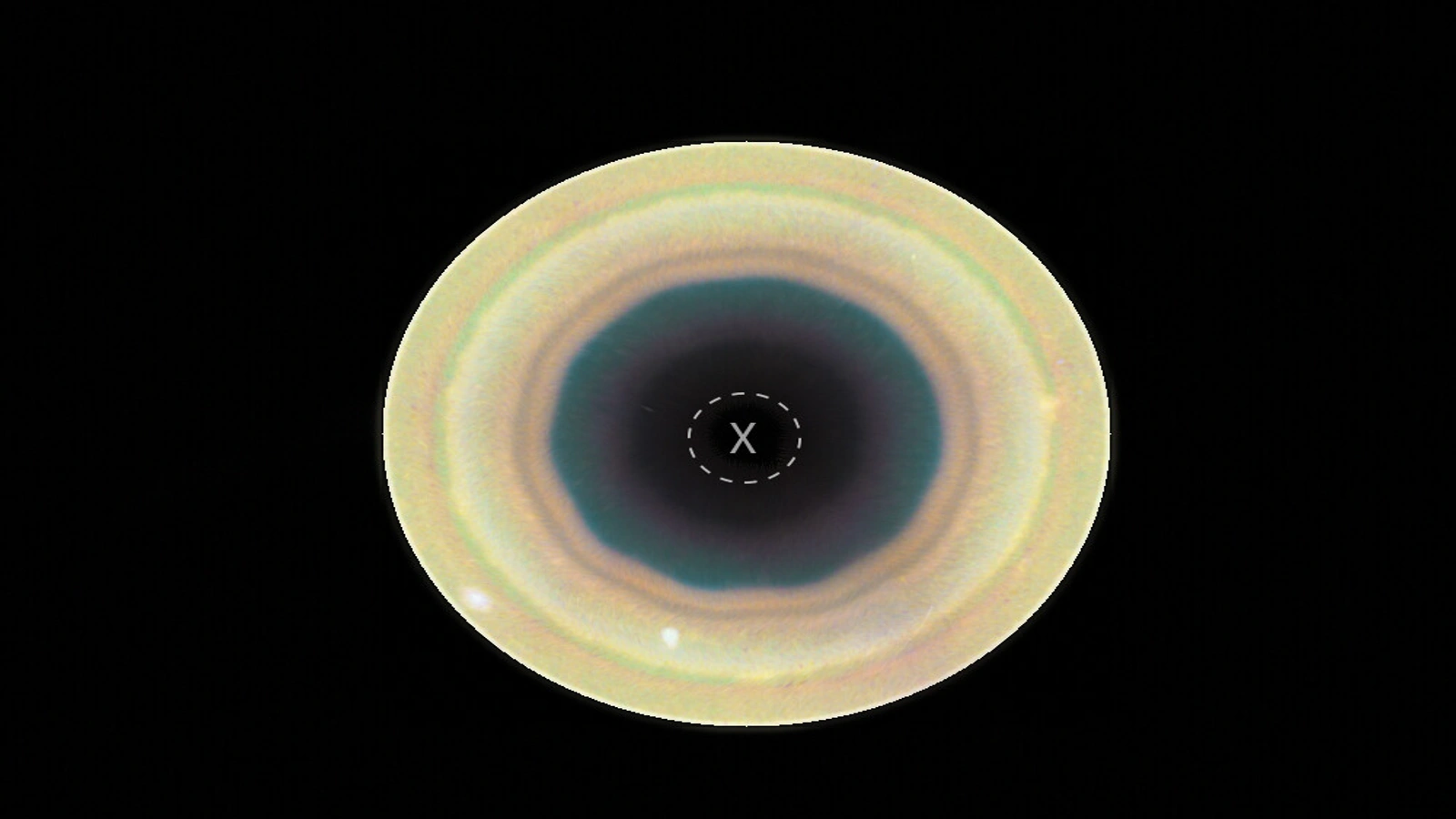 ESA/Hubble polar image of Saturn’s south pole showing a bright atmospheric pattern around the marked central polar region.
