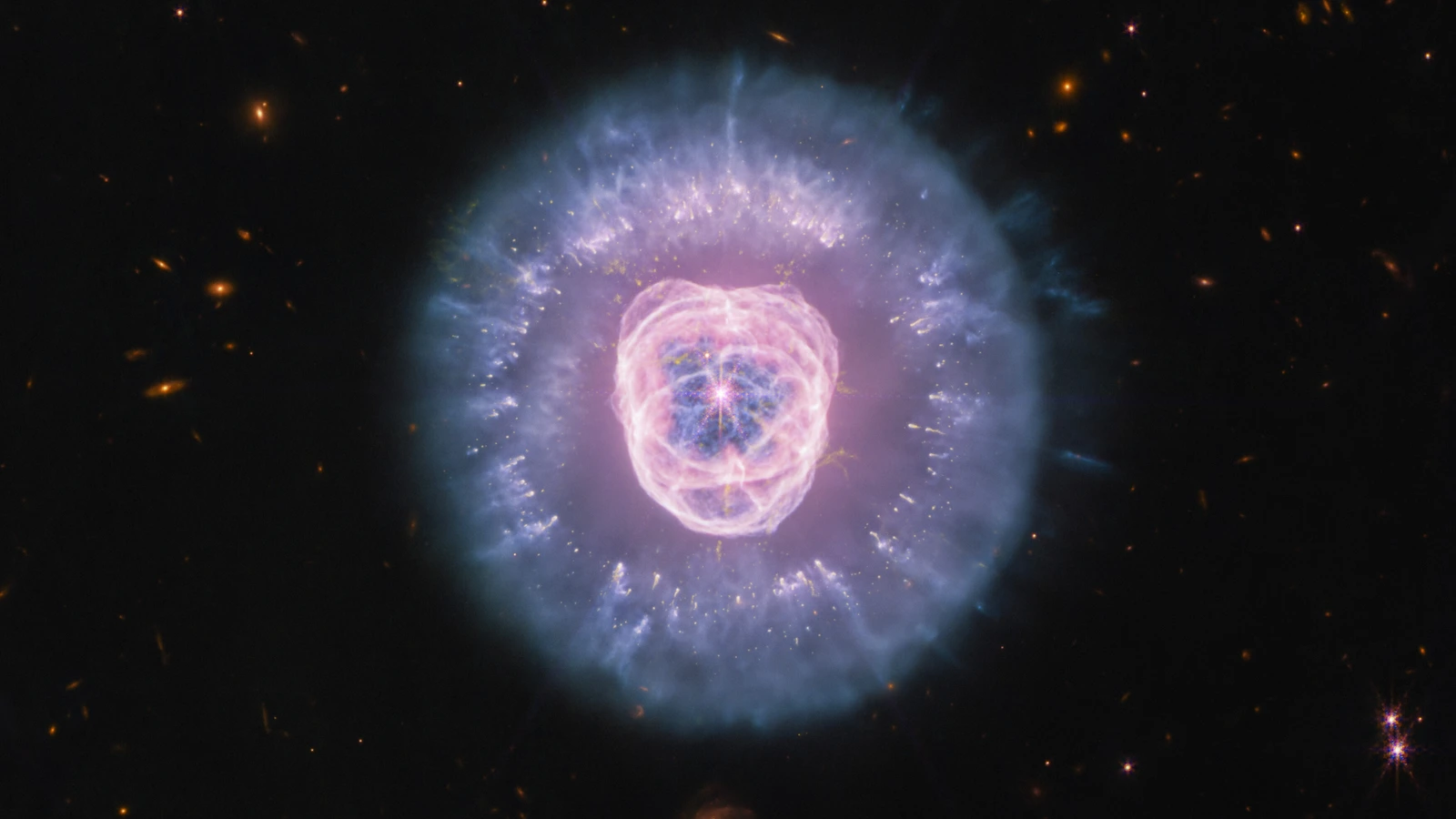 NASA ESA CSA and STScI image of the planetary nebula NGC 2392, the Lion Nebula, combining Webb NIRCam and MIRI observations